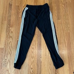 TNA size M black joggers with stripe